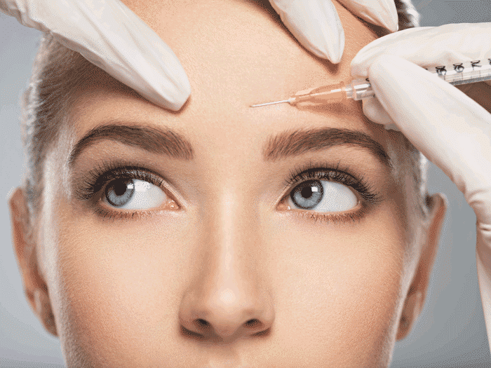 Woman getting injected with Botox.