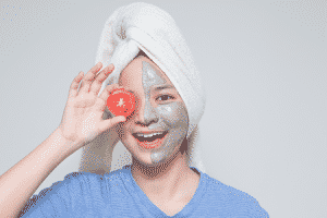 A young woman wearing a face mask.