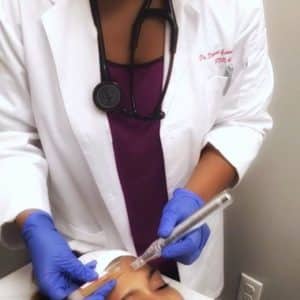 Dr. Dishani Applying A Non-Invasive Vampire Facial Treatment